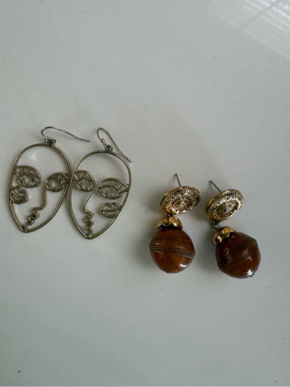Vintage face earrings and brown beaded earrings
